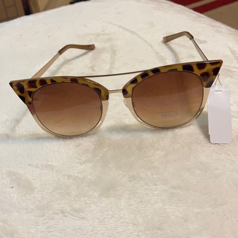 3/$20 bundle and save 💕NY&Co. sunglasses.